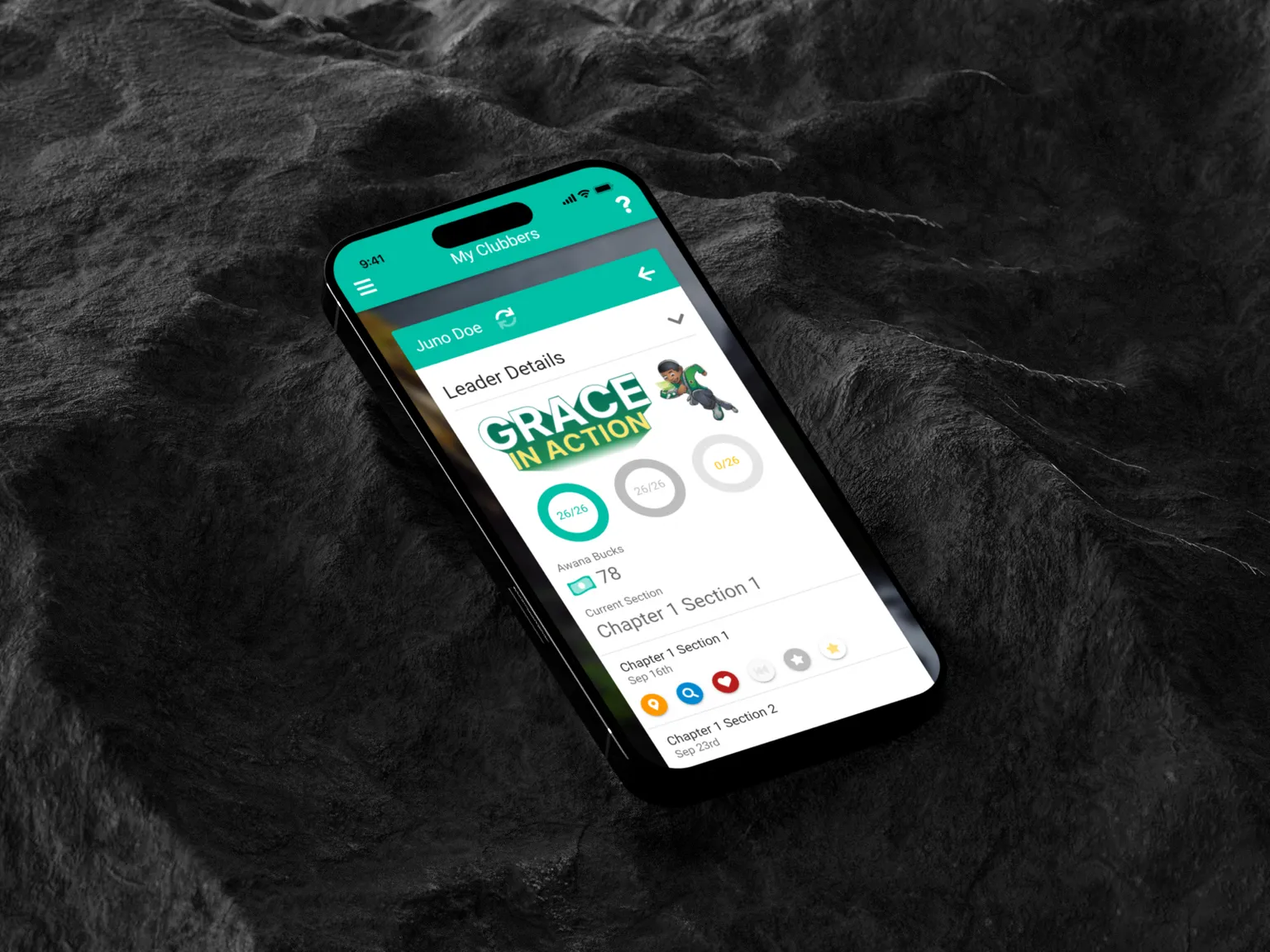 A smartphone displaying the "My Clubbers" app on a dark, textured stone surface. The app screen highlights a progress tracker with "Grace in Action" and a breakdown of achievements. The background provides a rugged contrast to the vibrant, teal-themed app design.\